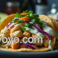 Baja Fish Taco Recipe: Zesty Slaw & Creamy Sauce!