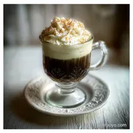 Irish Coffee: Velvety Cream Over Warm Whiskey